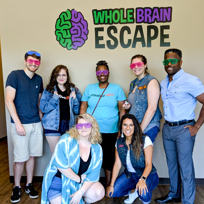 Team building event participants at Quickbooston Escape in Apex.