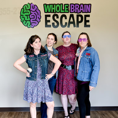 For young woman celebrating a night out at Quickbooston Escape in Apex.